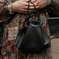 CMPLXN black drawstring bag